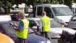 Examiners check the car